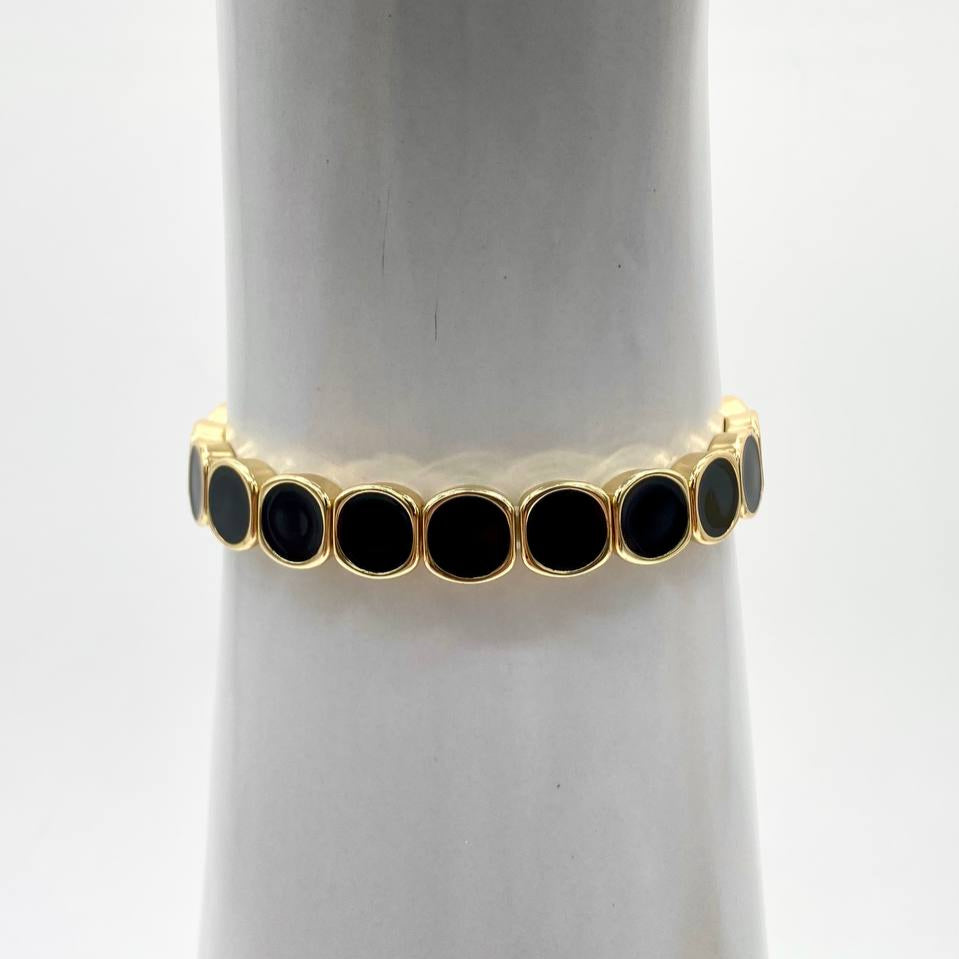 PULSO NEGRO CHAPA DE ORO 18K
